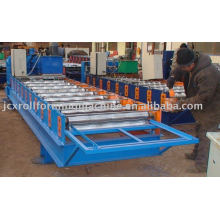 Roof panel forming machine